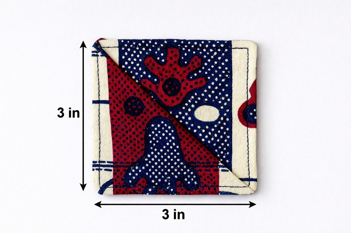 Cream, maroon, & blue corner bookmark with abstract design 3x3 dimensions shown on a light gray background