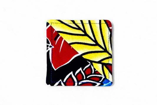 Black, white, blue, yellow, & red corner bookmark on light gray background