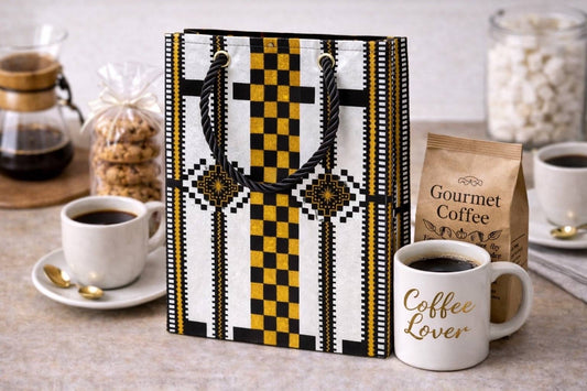 White, black, & gold handmade African fabric extra small gift bag in lifestyle shot