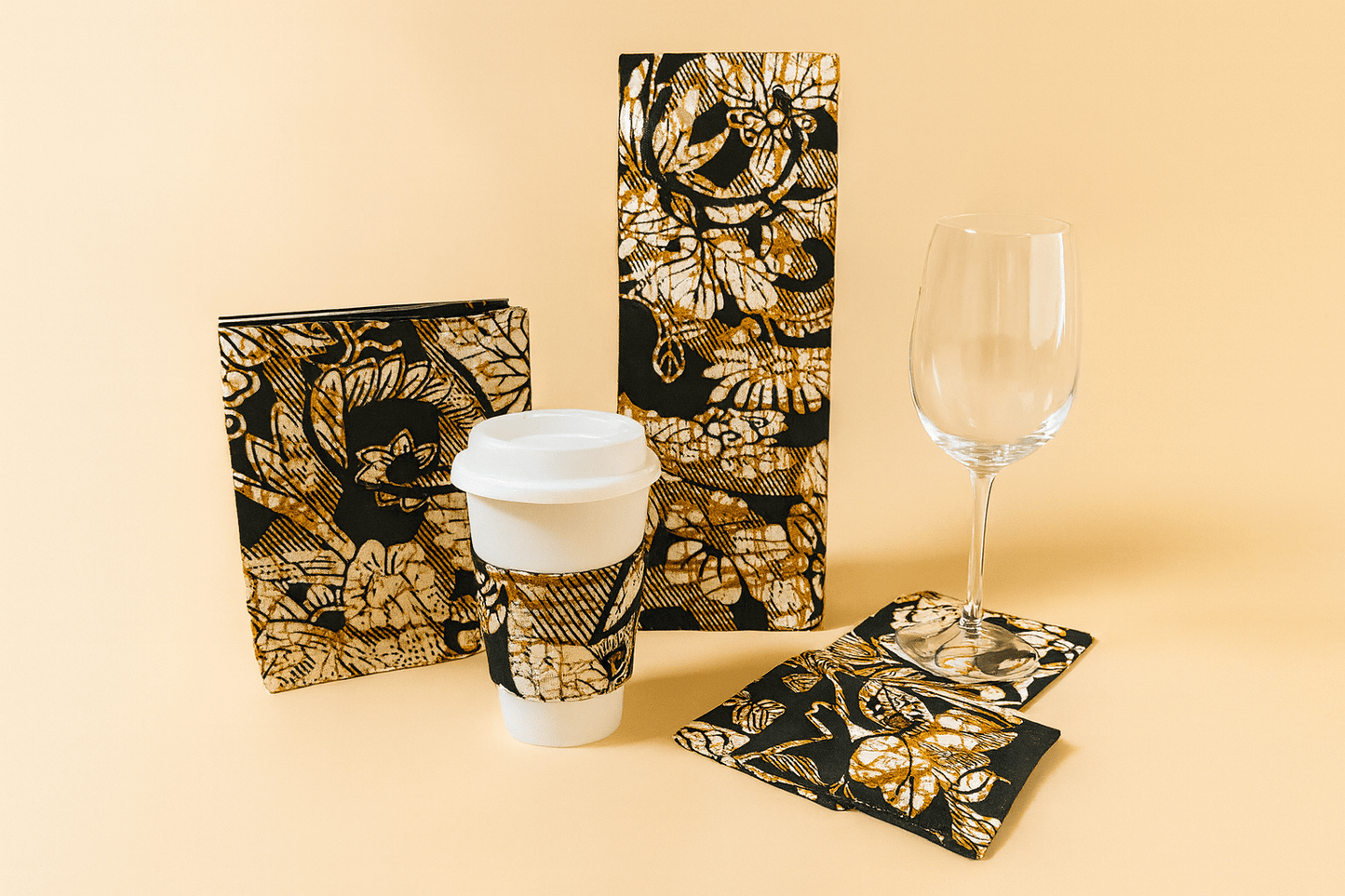 🌍 African Wax Print Cup Sleeve | Black, Cream, and Gold | Reusable Coffee Cozy | Eco - Friendly Gift ☕🌿 - Gezia Accents