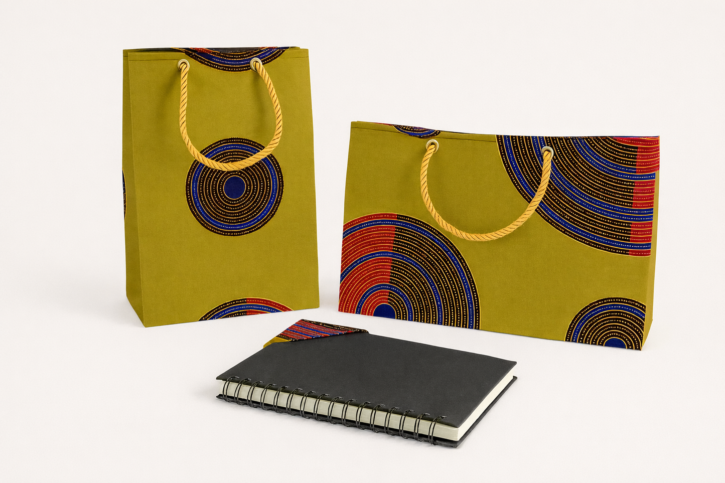 Green, Yellow, Red, Blue, & Brown small square bag, medium horizontal bag, & corner bookmark on a white background