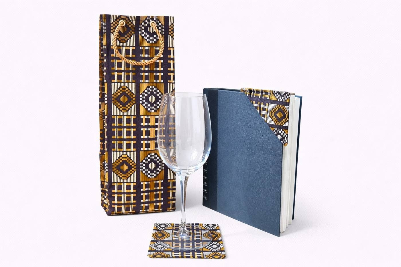 Wine bag, four piece coaster set & corner bookmark on a white background