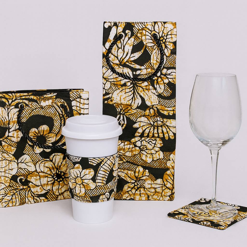 Cream, black, & gold extra small bag, wine bag, cup sleeve, & coaster on a white background