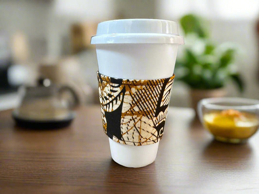 "African Wax Print Cup Sleeve - Black, Cream & Gold| Reusable Coffee Cozy - Gezia Accents"