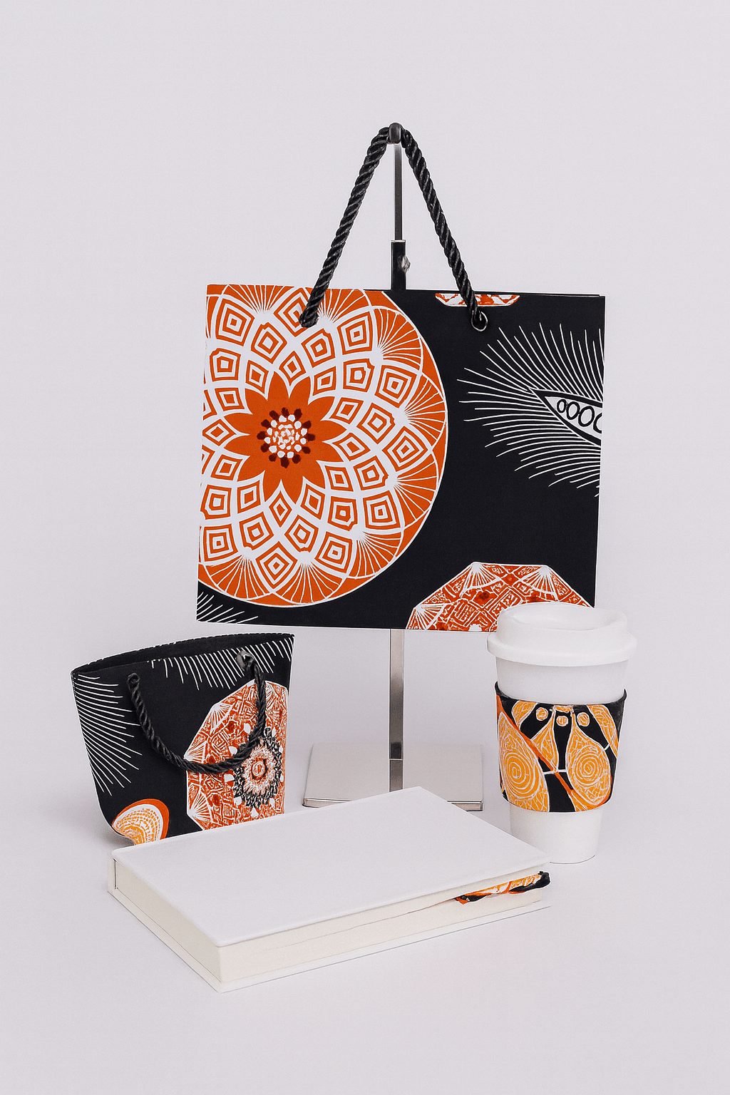 ๐ค Handmade African Wax Print Small Gift Bag | Black, White & Orange Fabric Bag | Reusable Eco - Friendly Gift Wrap | Cultural Gift Idea ๐๐ - Gezia Accents