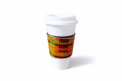 Orange, green, red, black & white African wax print cup sleeve on coffee cup