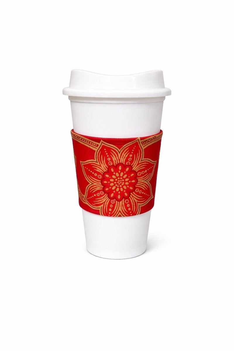 Red & gold African wax print cup sleeve on coffee cup
