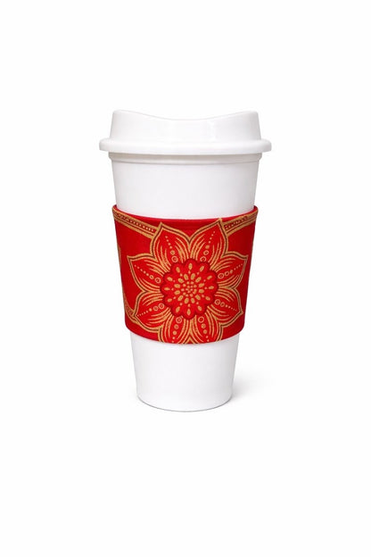 Red & gold African wax print cup sleeve on coffee cup