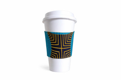 Turquoise, royal blue, black & gold African wax print cup sleeve on coffee cup