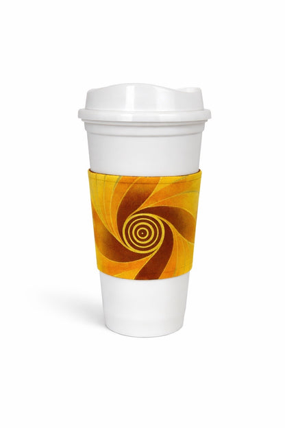 Yellow, brown, orange & gold African wax print cup sleeve on coffee cup