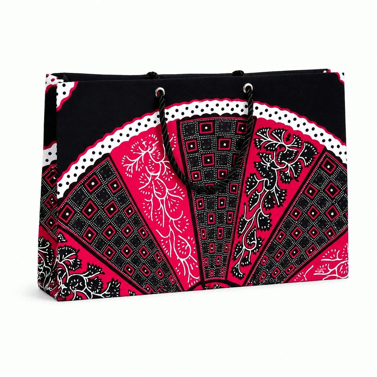 Black, fuchsia, and white patterned bag on a white background