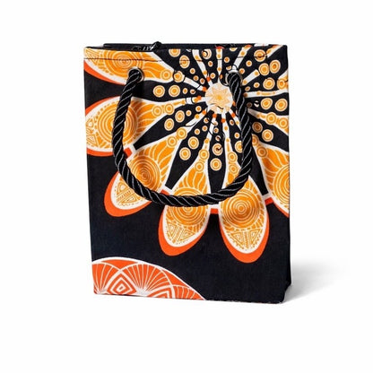 Black mini gift bag with orange and white abstract pattern on a white background