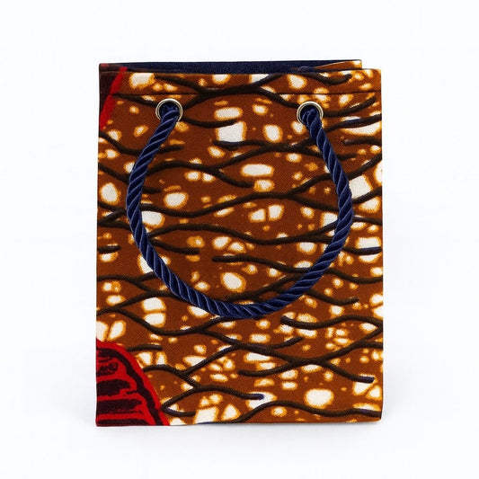 Dark brown decorative gift bag with cream, dark blue, & maroon pattern on a white background