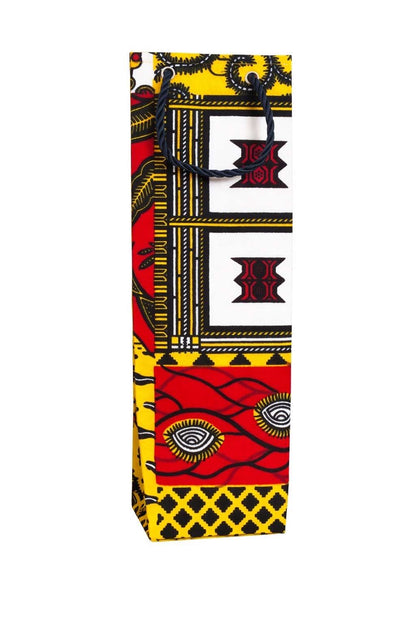 White, red, yellow, and dark blue wine bottle gift bag with African print design on a white background