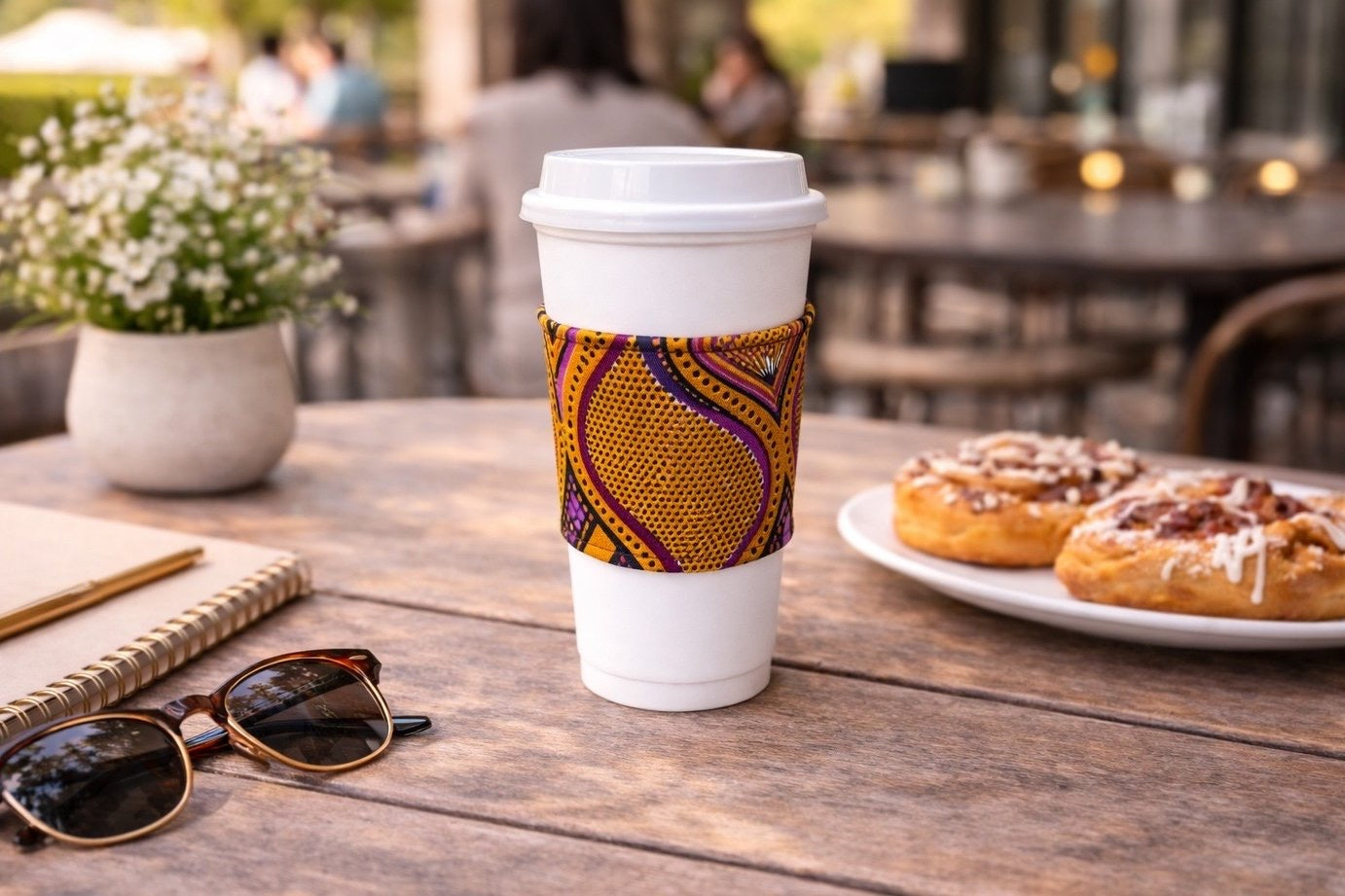 Handmade African fabric cup sleeve lifestyle shot