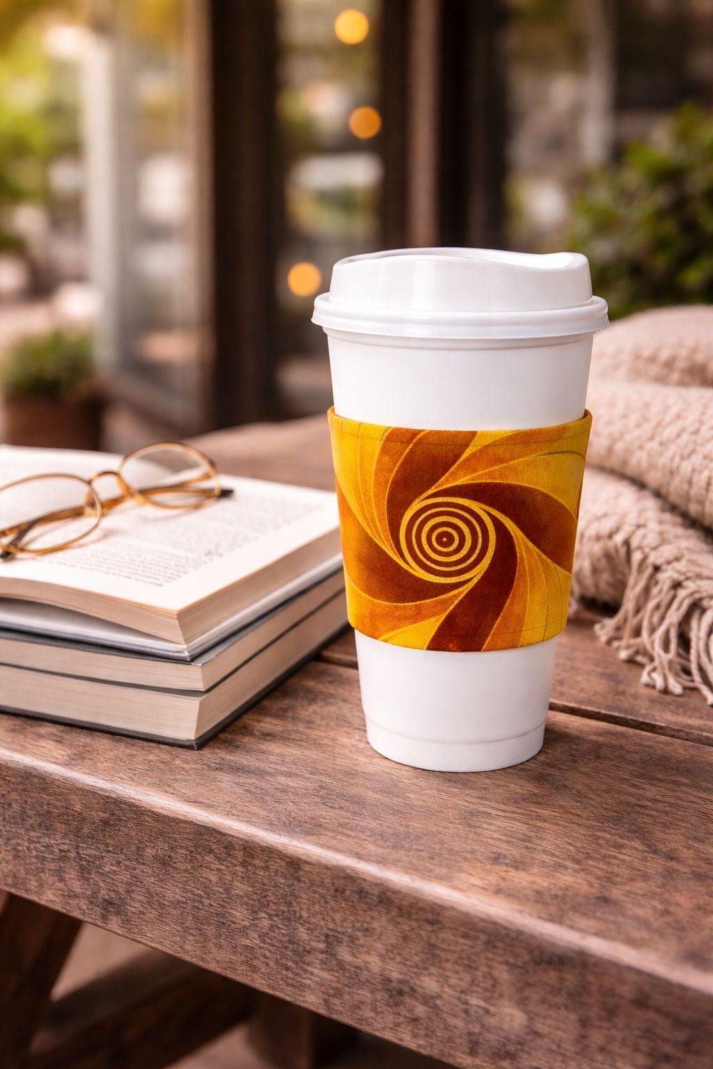 Handmade African fabric cup sleeve lifestyle shot