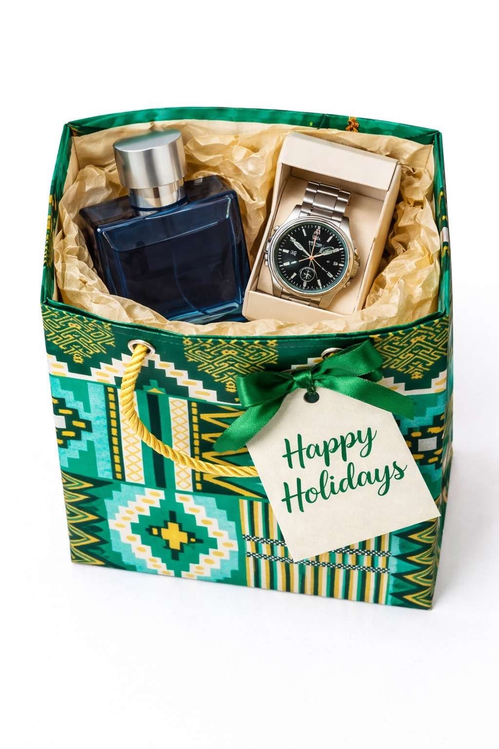 Dark green, green, white, & gold extra small gift bag with product ideas inside the bag on a white background