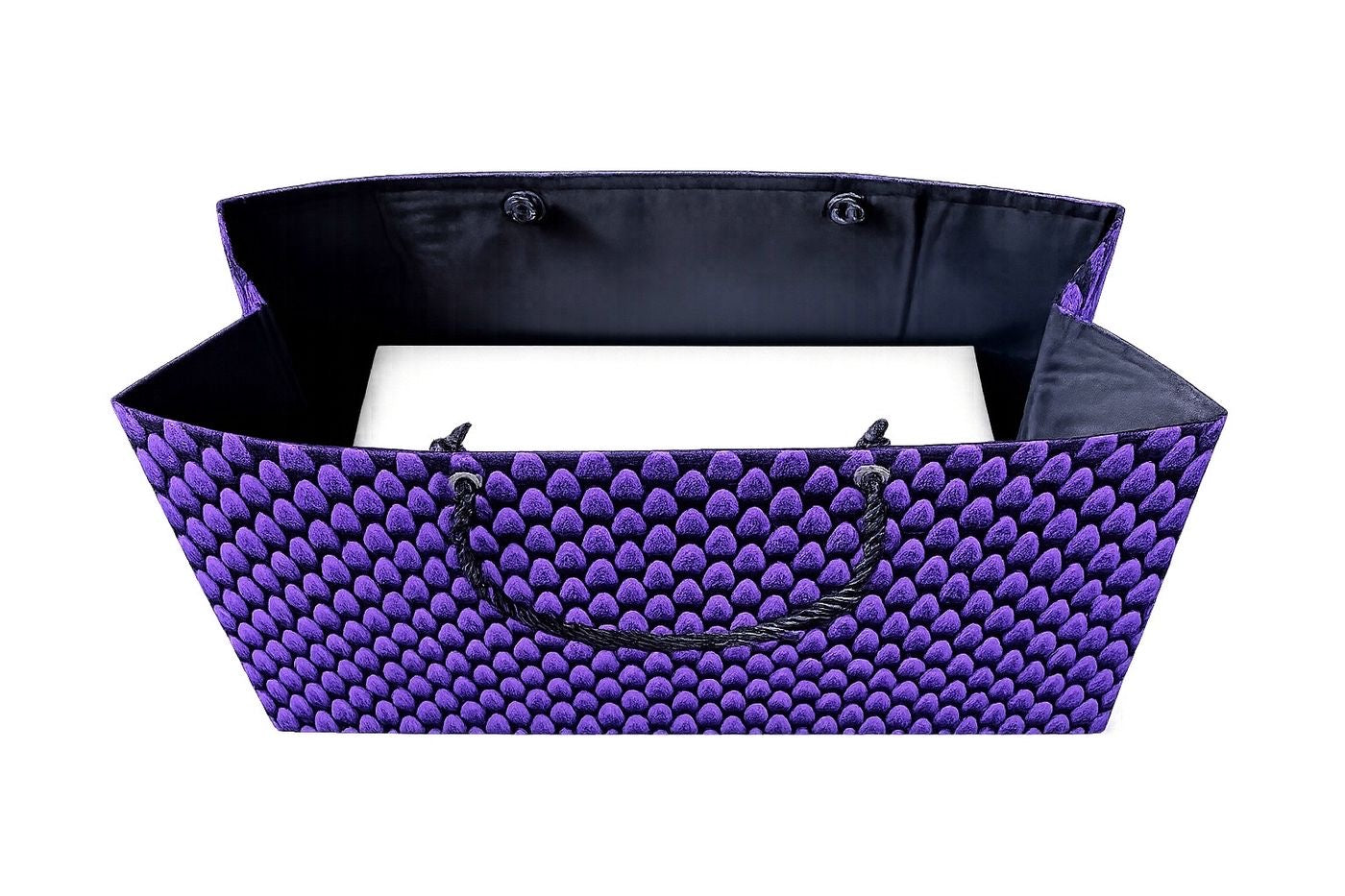 Inside view of a purple and black patterned gift bag bin on a white background