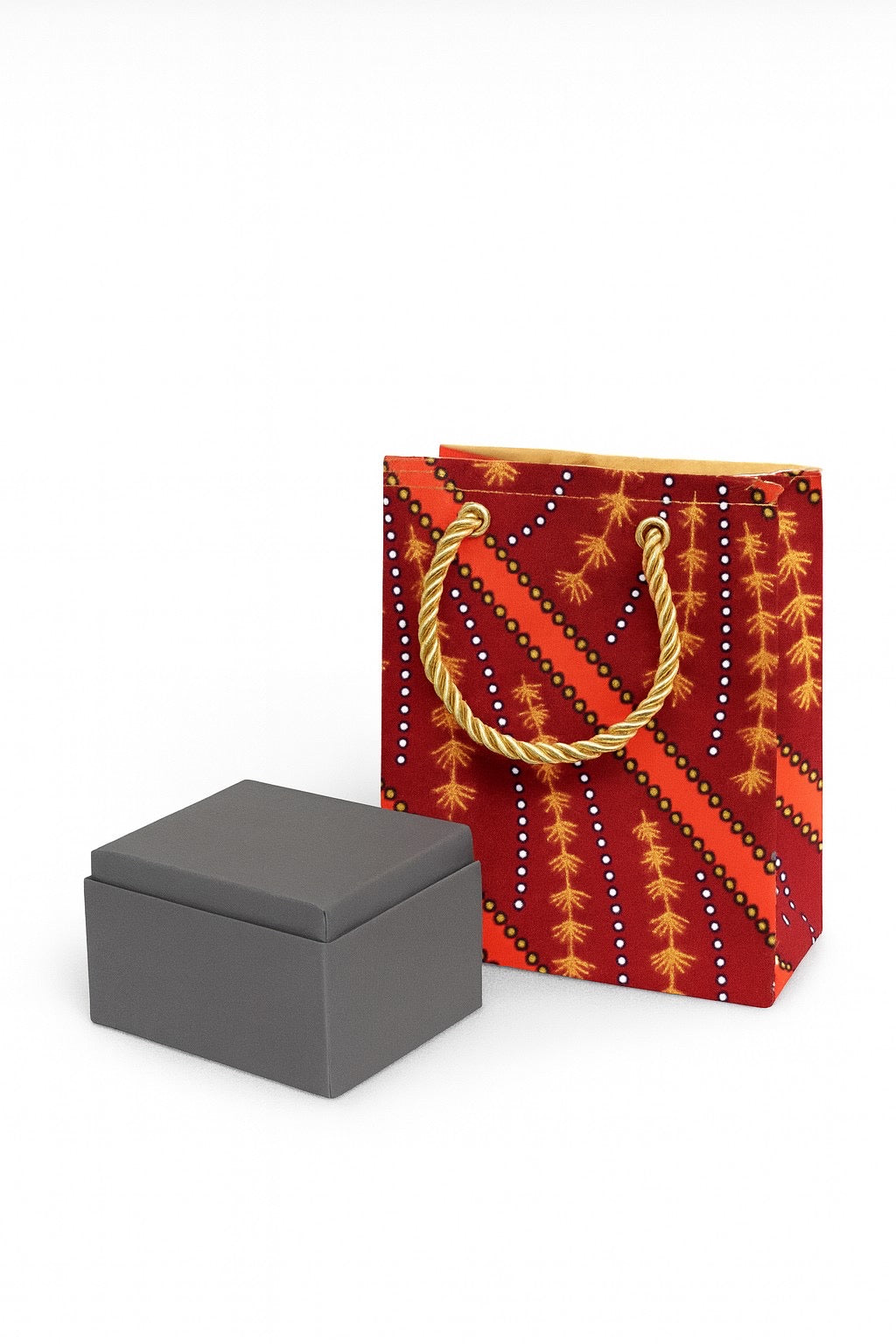Maroon, orange, black & white mini gift bag with product ideas to gift on the side on a white background