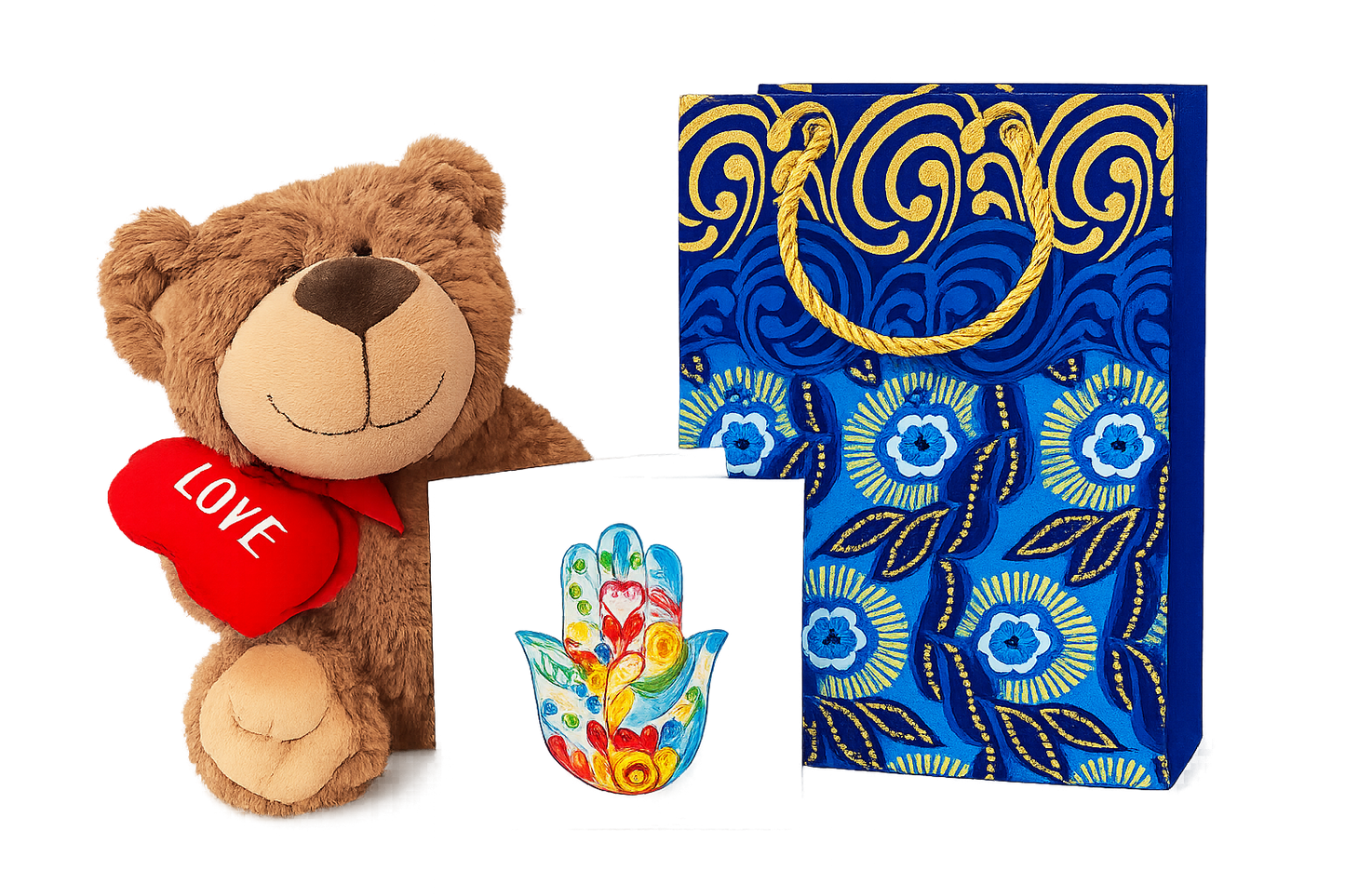 Plush teddy bear with a heart, colorful hamsa hand, and decorative small blue bag on a white background