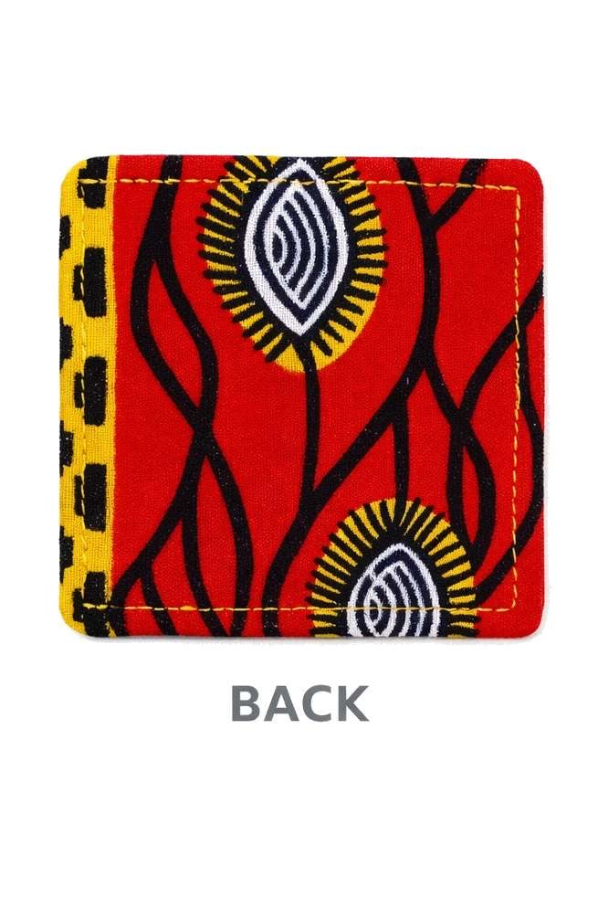 Back view of a African print bookmark with red, black, and yellow design on a white background