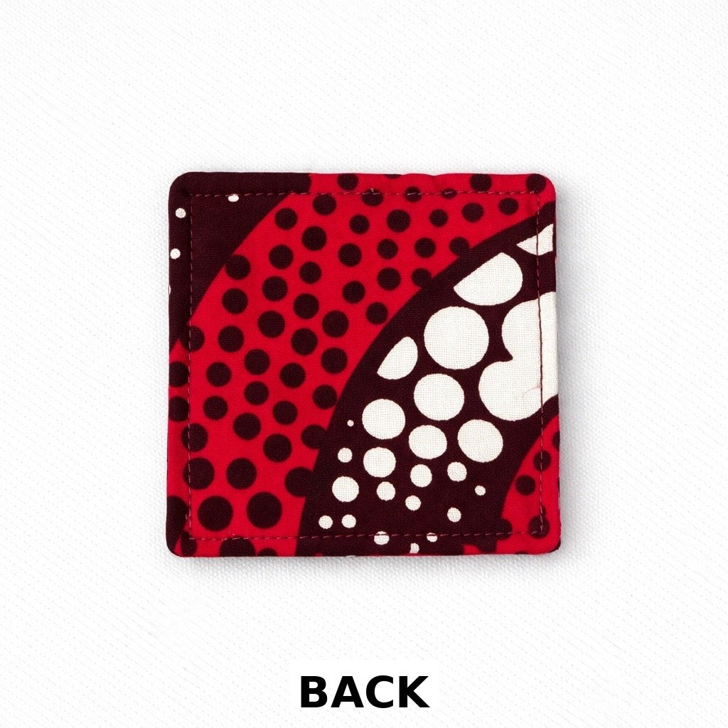 back view of corner bookmark with red, brown, & white patterns on a light gray background