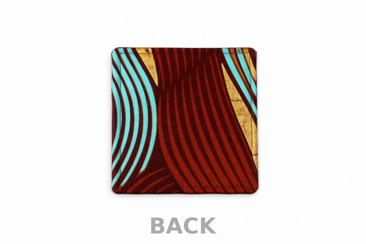 back view of brown corner bookmark with turquoise & gold patterns on a light gray background.