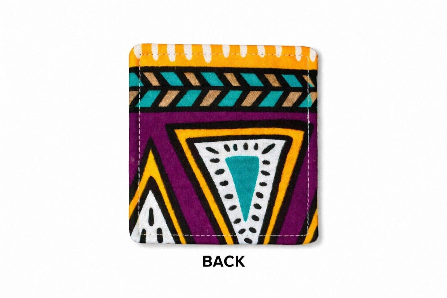 back view of yelllow corner bookmark with purple, green, taupe, white patterns on a light gray background