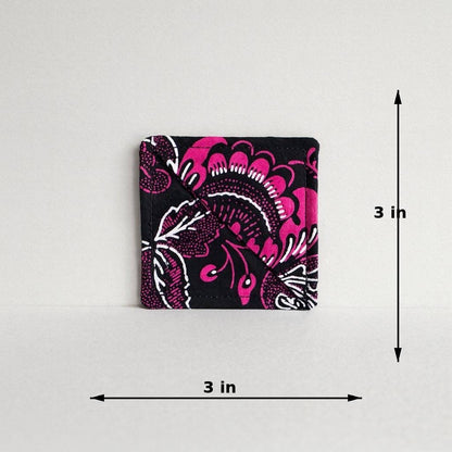 Black, pink & white corner bookmark with abstract design 3x3 dimensions shown on a light gray background