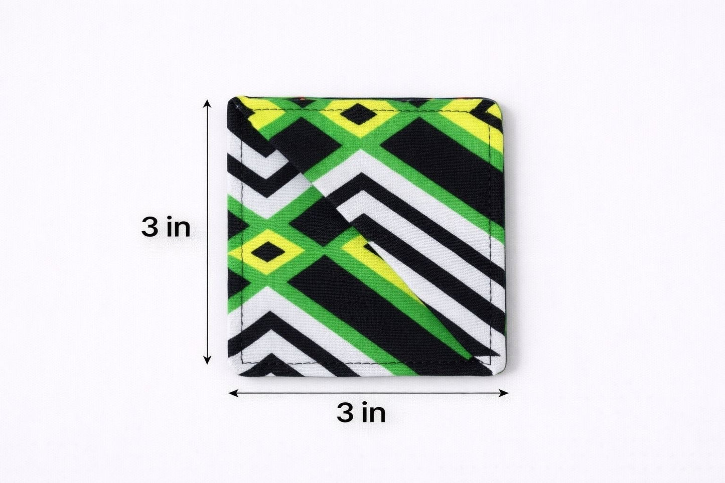 Colorful black, green, yellow, & white corner bookmark with abstract design 3x3 dimensions shown on a light gray background