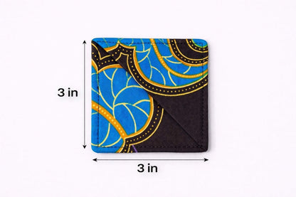 Dark brown, red, blue, & yellow corner bookmark with abstract design 3x3 dimensions shown on a light gray background