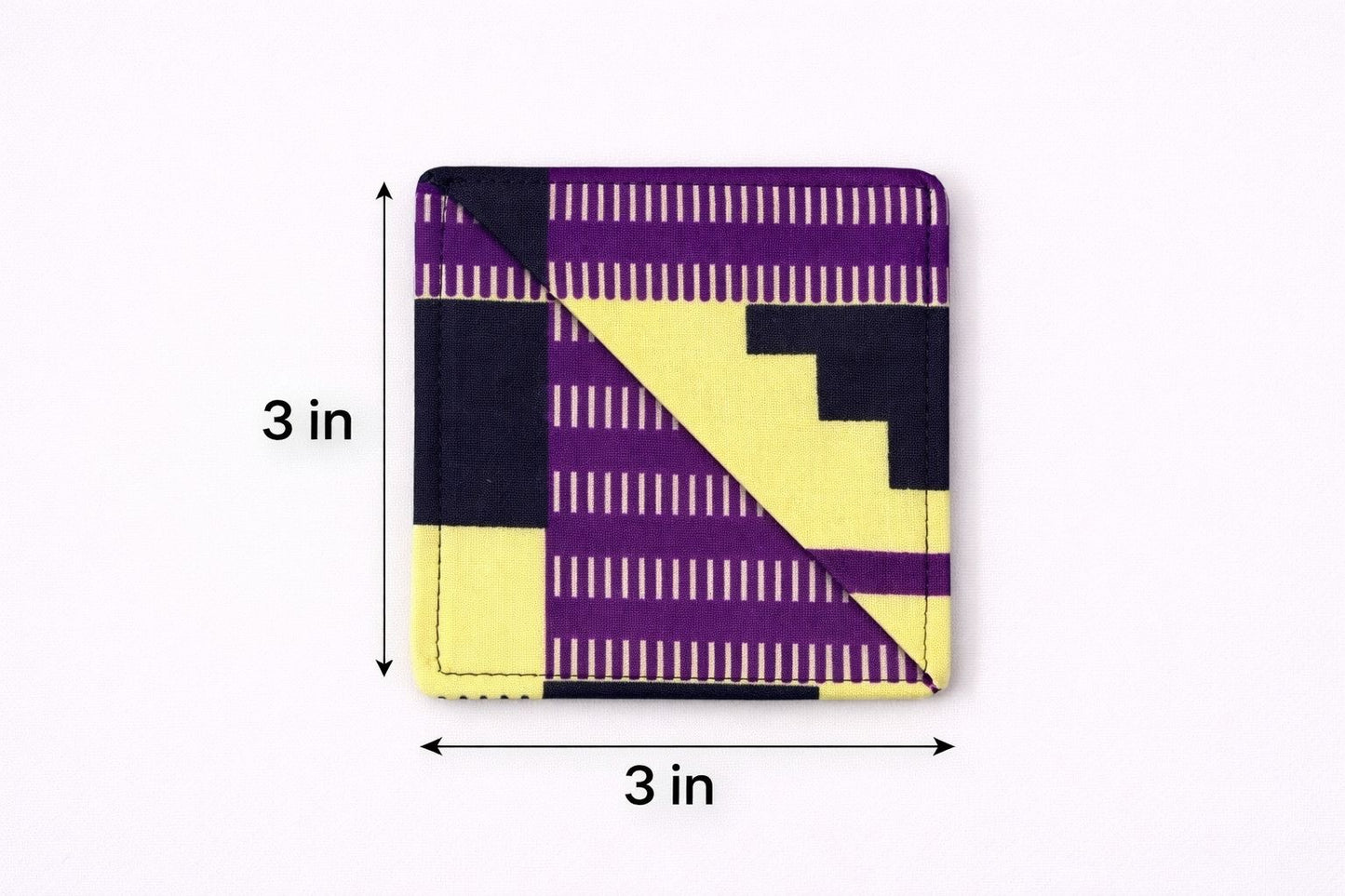 Yellow, purple, & black corner bookmark with abstract design 3x3 dimensions shown on a light gray background