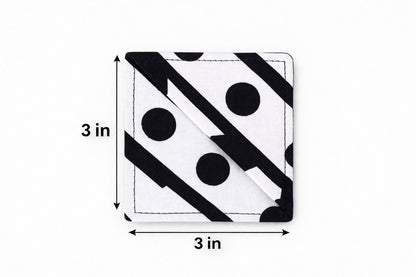 White, red & black corner bookmark with abstract design 3x3 dimensions shown on a light gray background 
