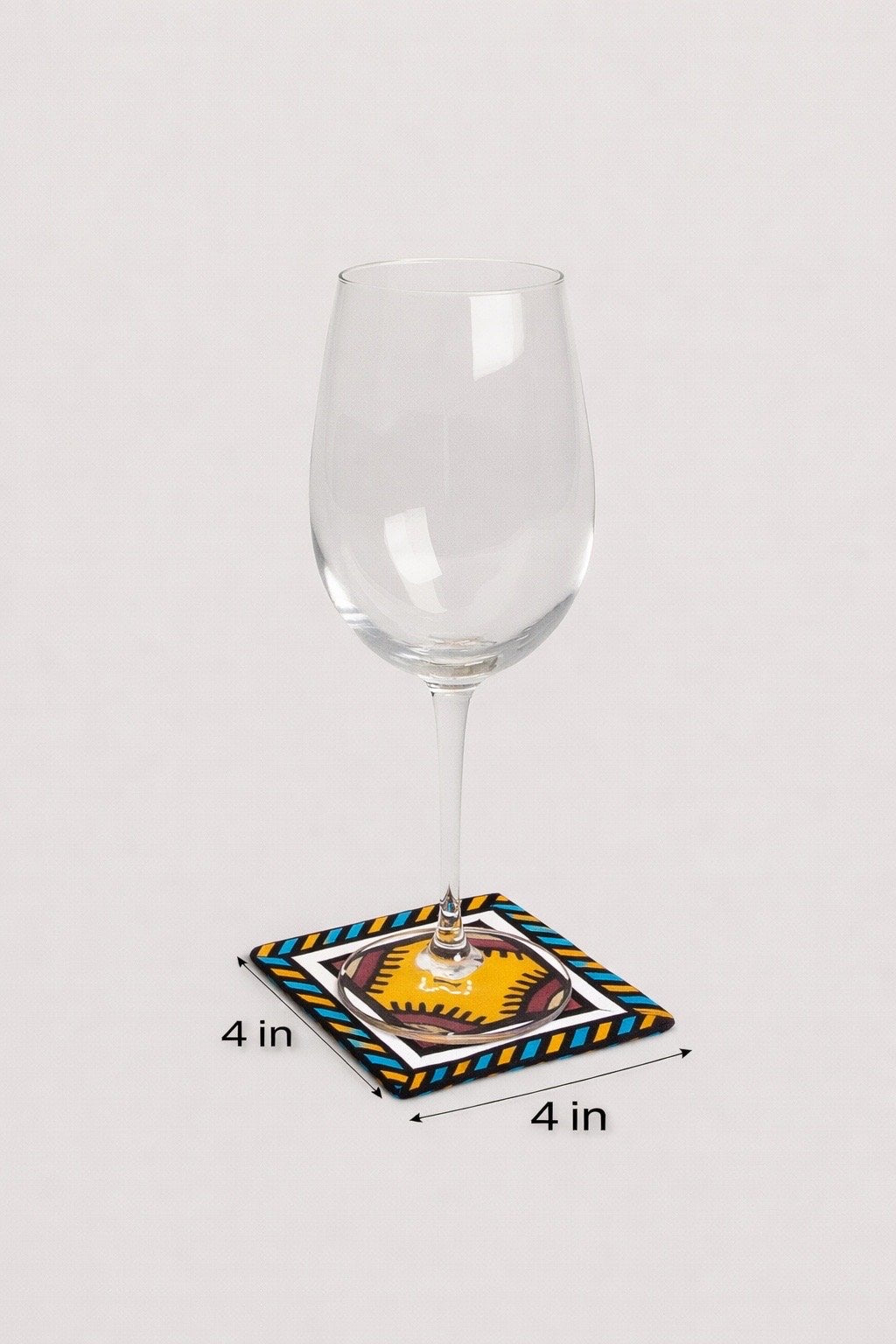 Purple, green, yellow, beige, white, & black patterned fabric coasters dimensions