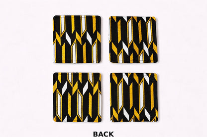 Back view of white, black, & gold patterned fabric coasters 