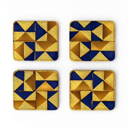 Set of 4 gold, dark blue, & brown African fabric coasters on white background