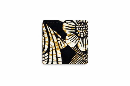 Black, cream, & gold corner bookmark on light gray background