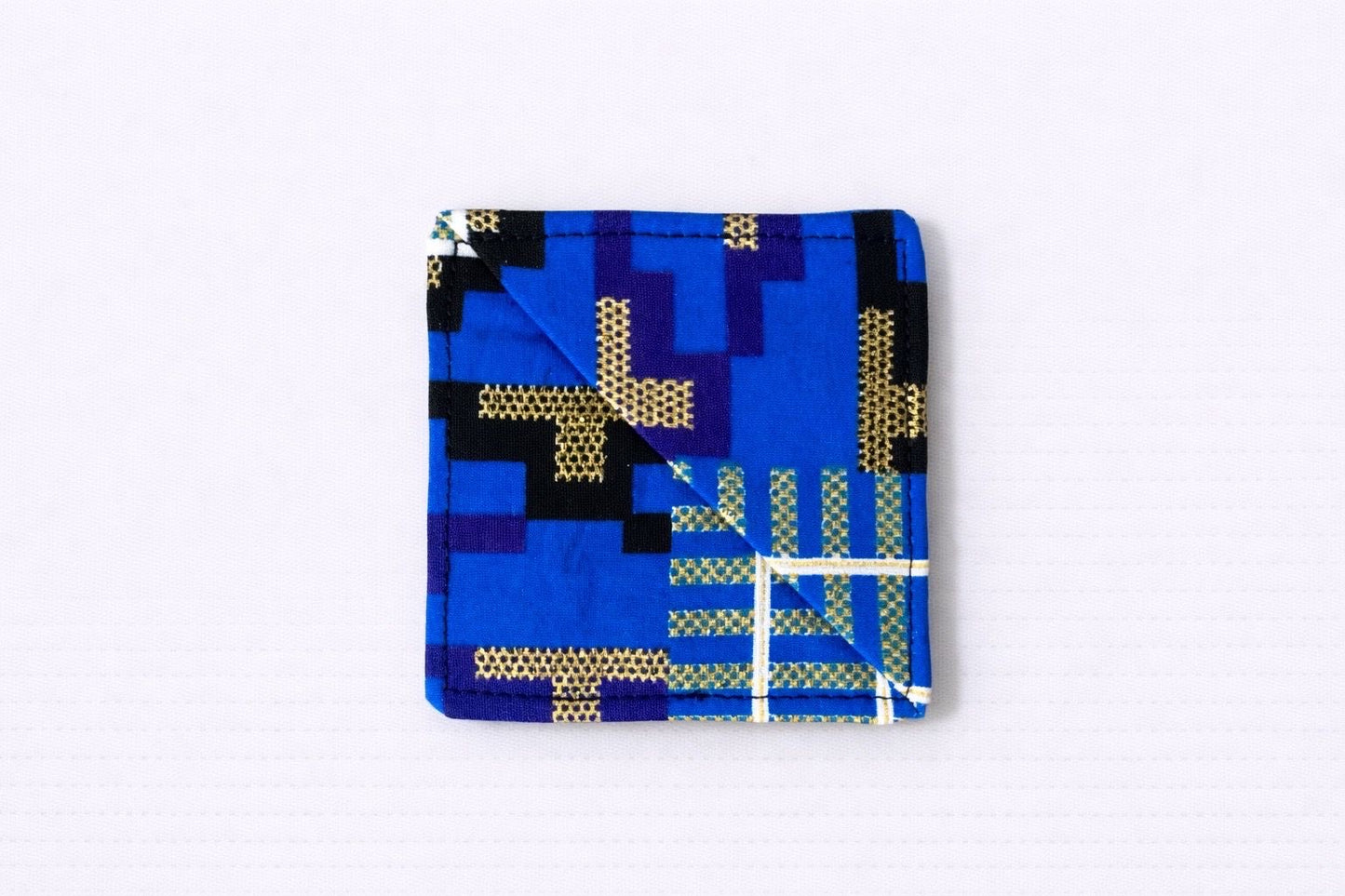 Blue, dark blue, purple, black, white, & gold corner bookmark on light gray background