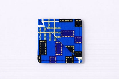 Blue, dark blue, purple, black, white, & gold corner bookmark on light gray background