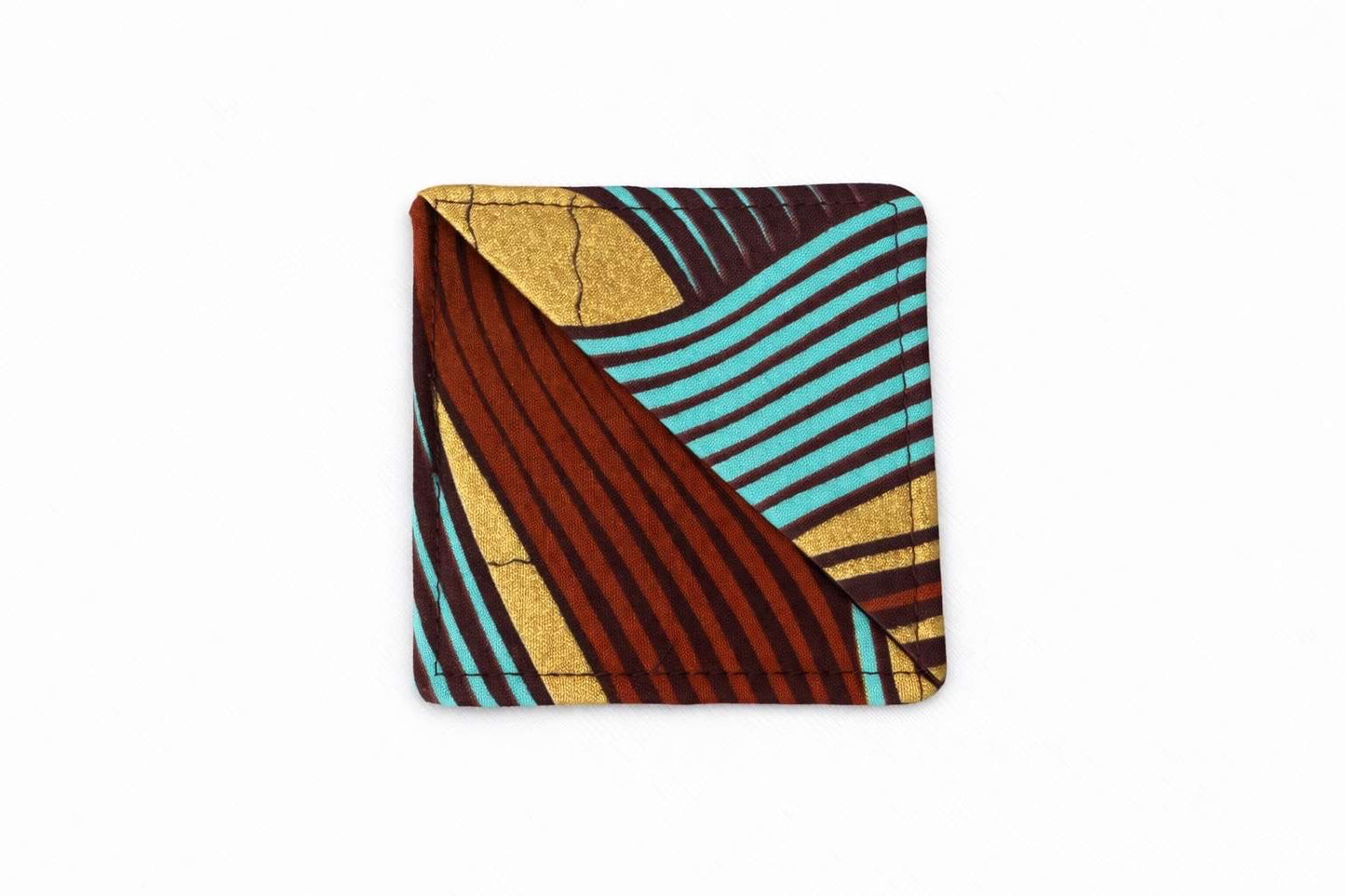Brown, turquoise, & gold corner bookmark on light gray background