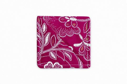 Fuscia and white corner bookmark on light gray background