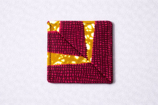 Pink, cream, brown, & gold corner bookmark on light gray background
