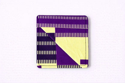 Yellow, purple, & black corner bookmark on light gray background