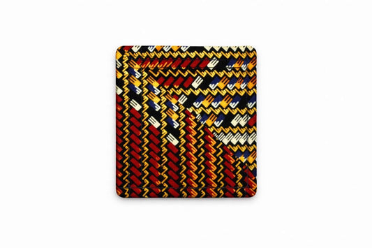 Red, blue, cream, & yellow corner bookmark on light gray background