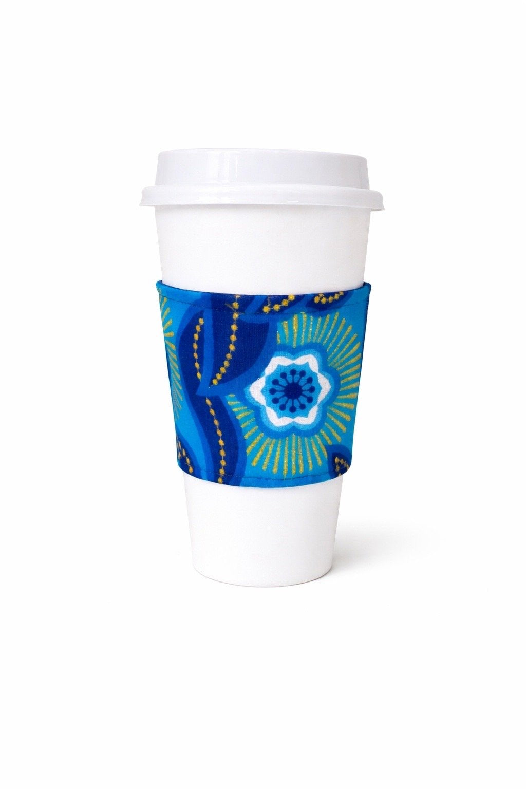 Dark blue, blue, white, & gold African wax print cup sleeve on coffee cup
