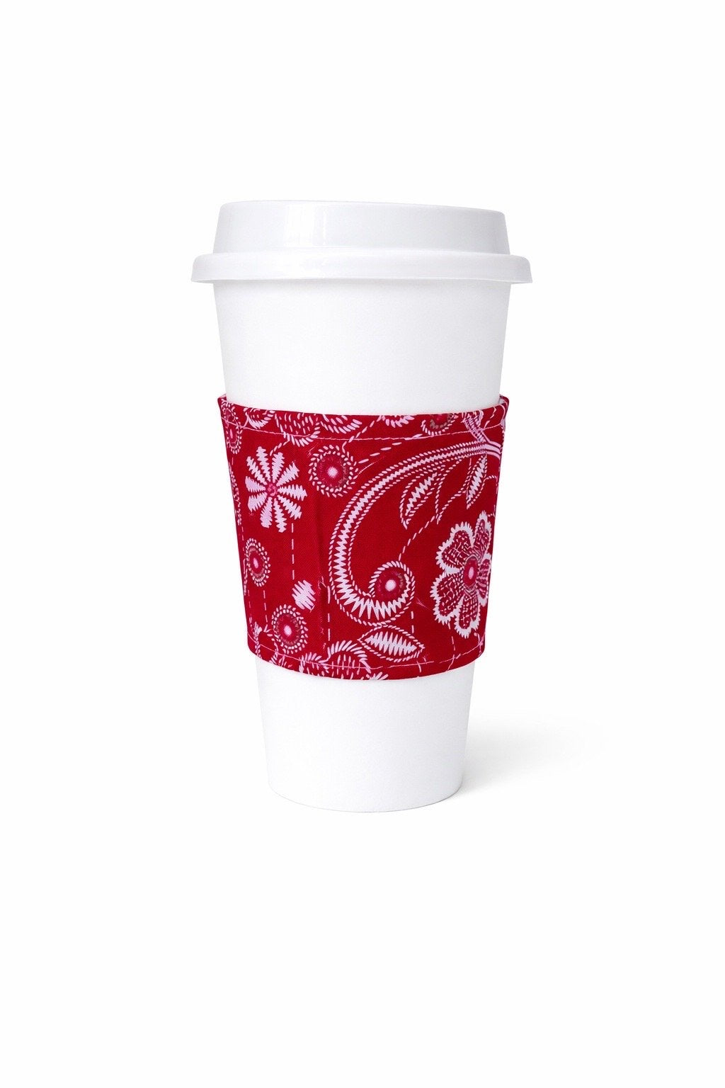 Fuchsia & white African wax print cup sleeve on coffee cup