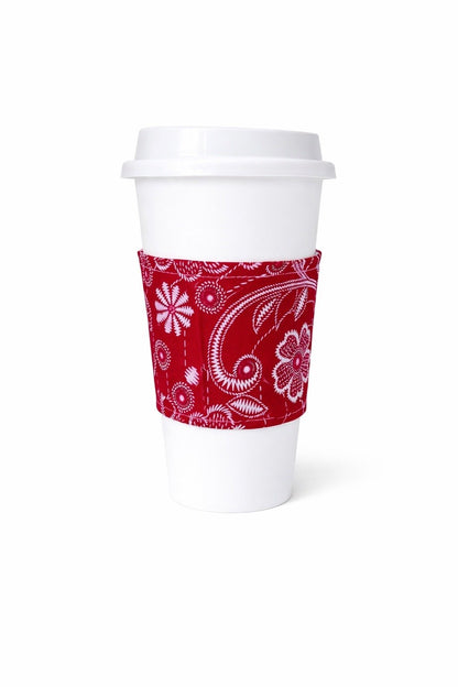 Fuchsia & white African wax print cup sleeve on coffee cup