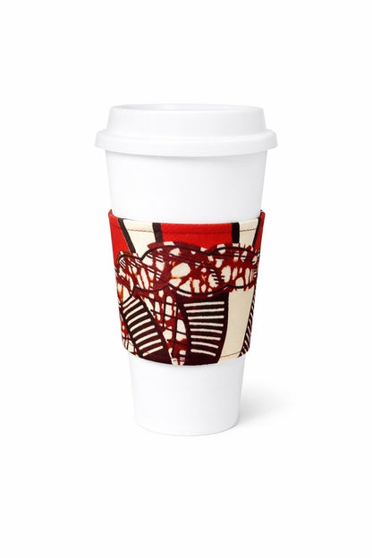 Red, cream, & dark brown African wax print cup sleeve on coffee cup