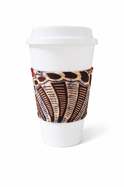Red, dark brown, & cream African wax print cup sleeve on coffee cup