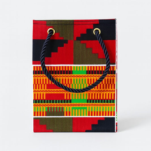 Orange, red, green, black, & white extra small gift bag on white background